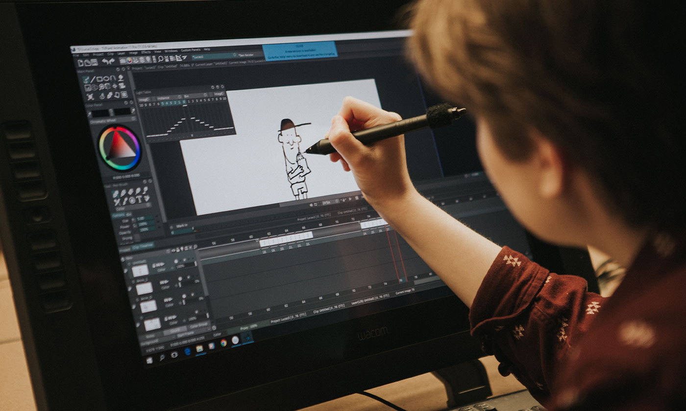 student animating on a Wacom digital drawing tablet
