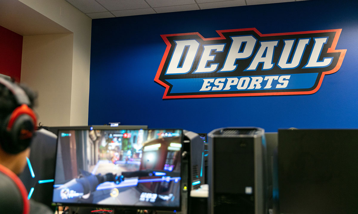 Gaming room with DePaul e sports  logo on wall