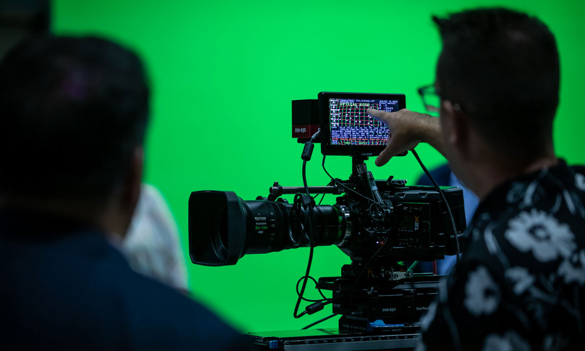 film director showing the camera monitor
