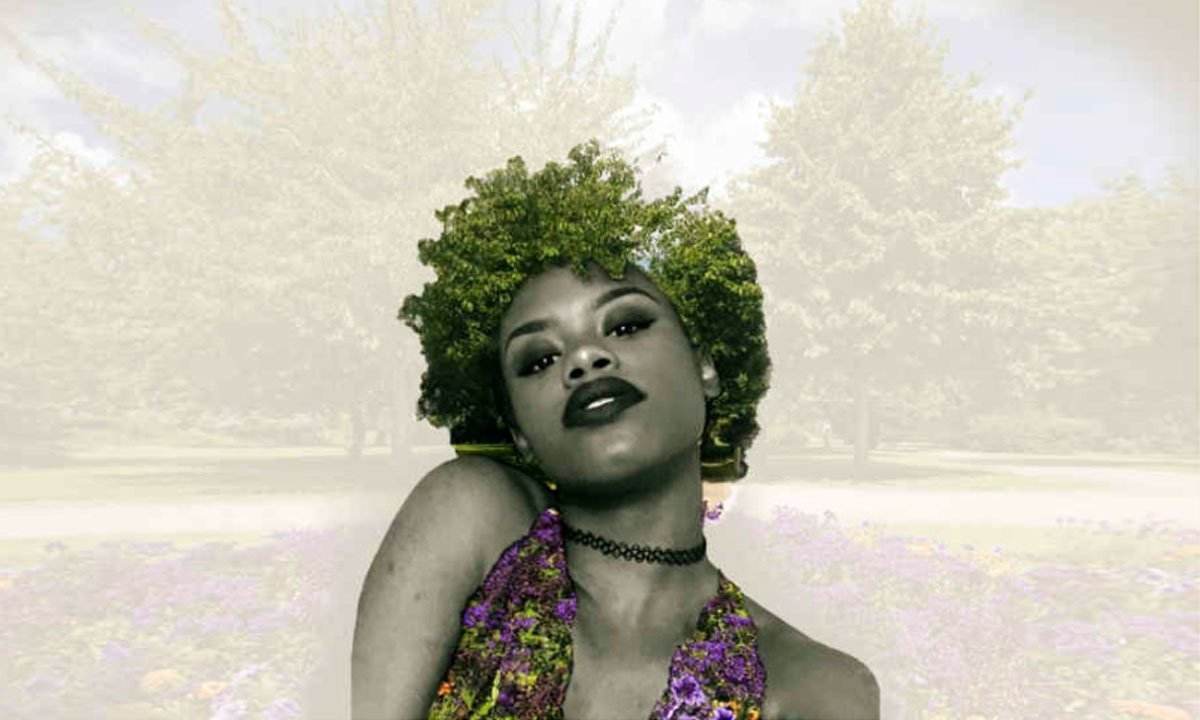 young lady's hair is made up from tree leaves and her top is lavendar flowers
